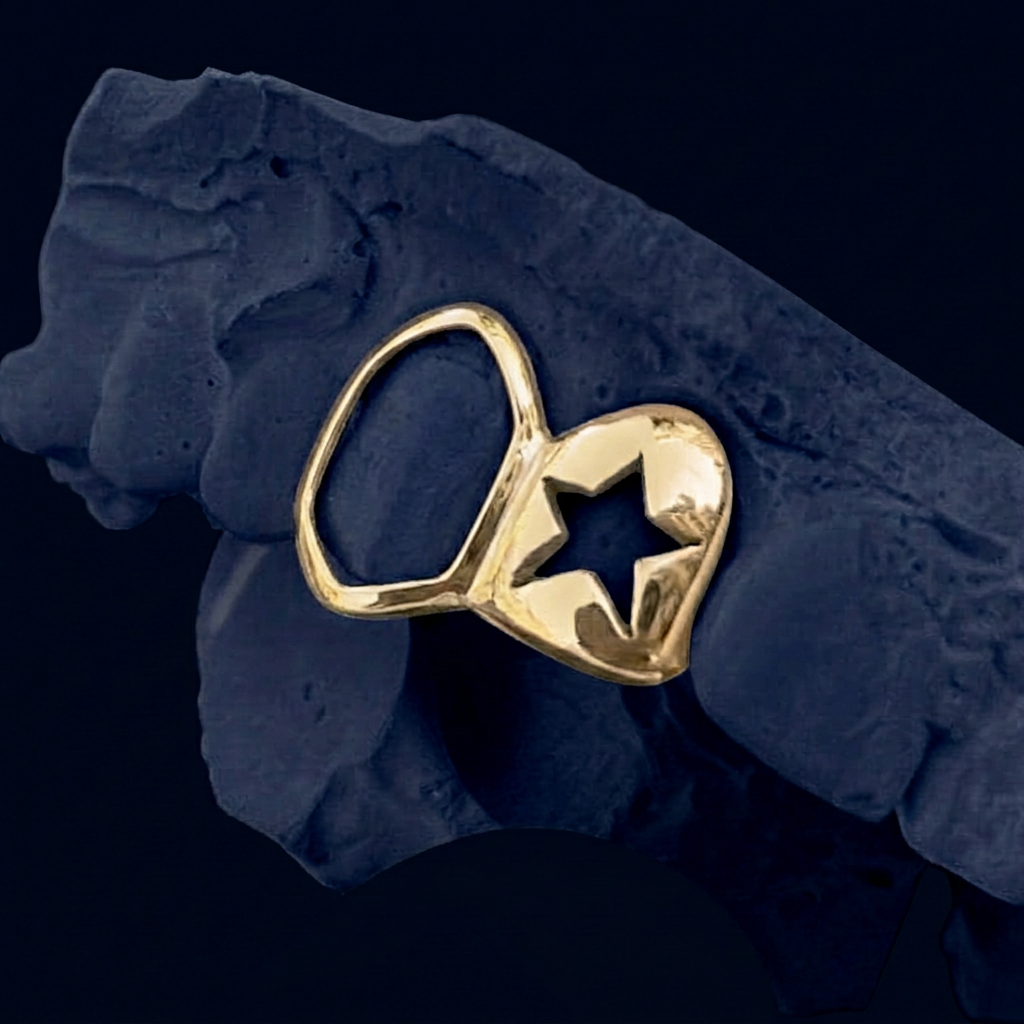 Gold Two Teeth Star Cut Out - yellow gold, open face fang - custom fit grillz handmade by Icestein Jewelers