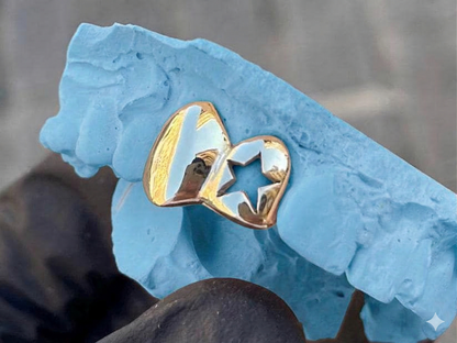 Gold Two Teeth Star Cut Out