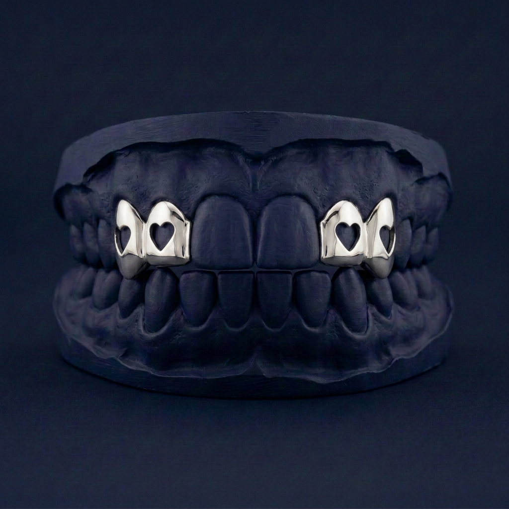 Silver Four Teeth Heart Cut Out