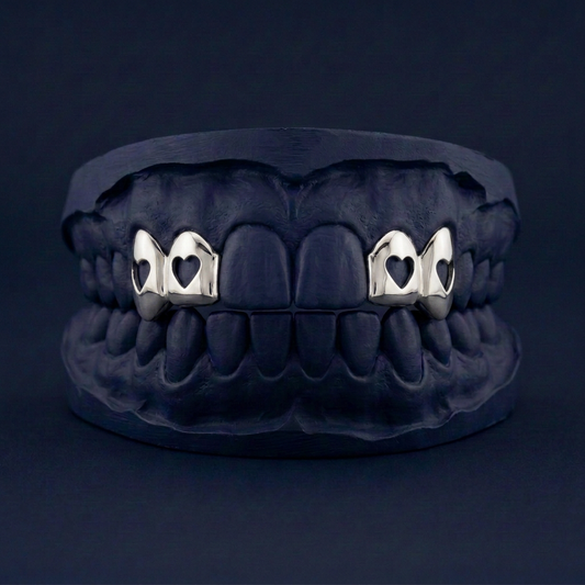 Silver Four Teeth Heart Cut Out
