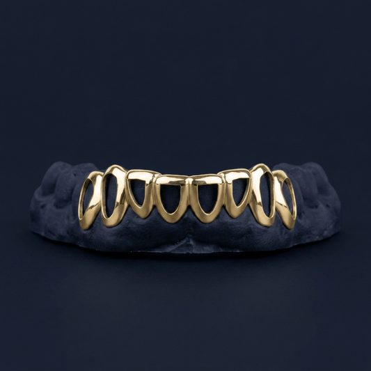 Gold Eight Tooth Open Face